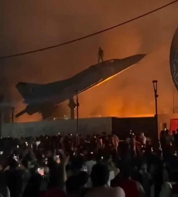 A student climbs atop a MiG-23 fighter jet during protests at Lovely Profession… · non aesthetic things